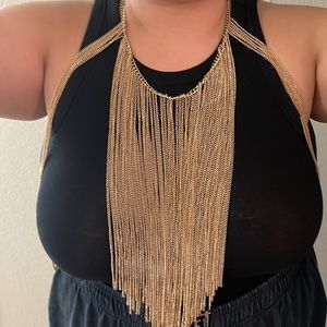 Gold necklace/ body chain.